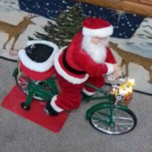 Mr. Christmas Cycling Santa
